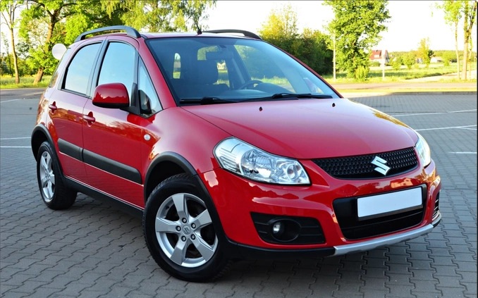 Suzuki SX4 cena 31900 przebieg: 93865, rok produkcji 2013 z Piastów małe 562